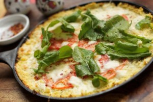 Cauliflower Pizza Crust Topped with Arugula Salad