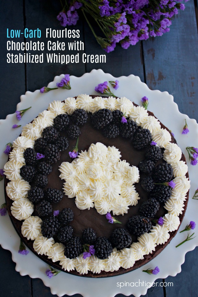 Low Carb Flourless Chocolate Cake with Stabilized Whipped Cream will make any day feel special. This is our go to dessert for almost every occasion. #spinachtiger via @angelaroberts