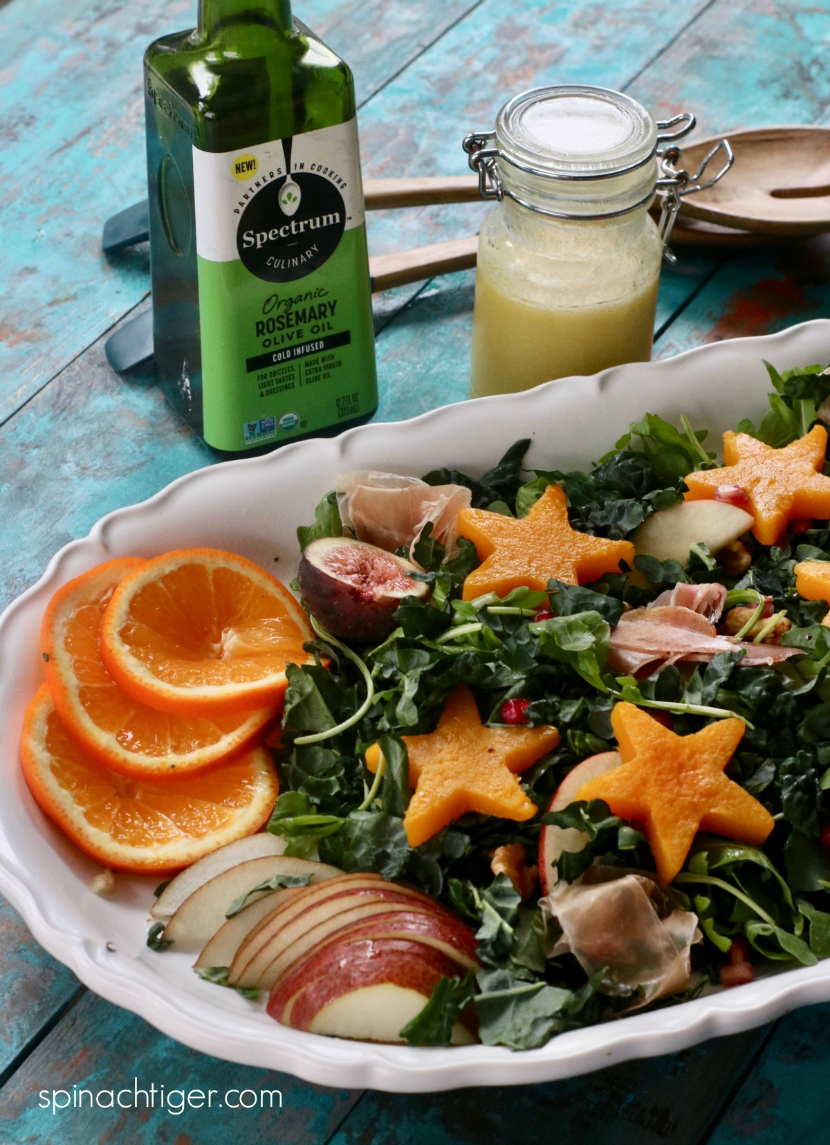 Festive Kale Salad with Rosemary Honey Vinaigrette from Spinach TIger