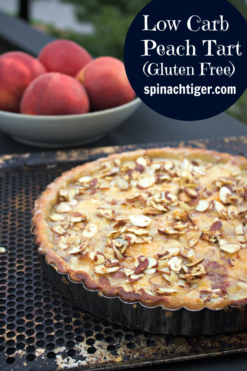Low Carb Peach Almond Tart with Low Carb Almond Flour Crust with Fresh Peaches, almond flour crust, heavy cream. 5 Net carbs per slice. #LOWCARBTART #PEACHDESSERTS #PEACHTART #SPINACHTIGER via @angelaroberts