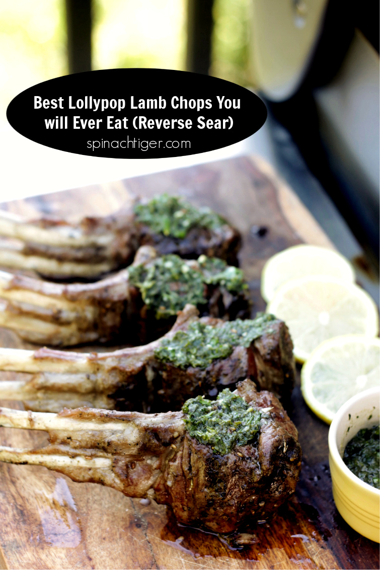 Grilled Lollypop Lamb Chops using a reverse sear with a mint pistou. These are the best lamb chops I have ever eaten. Reverse sear is easy and results in the best texture. Learn how to trim a rack of lamb and make perfect #lollypoplambchops. #lambchops #mint #lamb #grilledlamb #pistou #spinachtiger via @angelaroberts