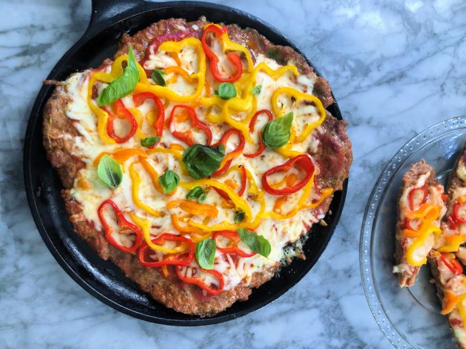 Sausage crusted keto pizza from Spinach Tiger