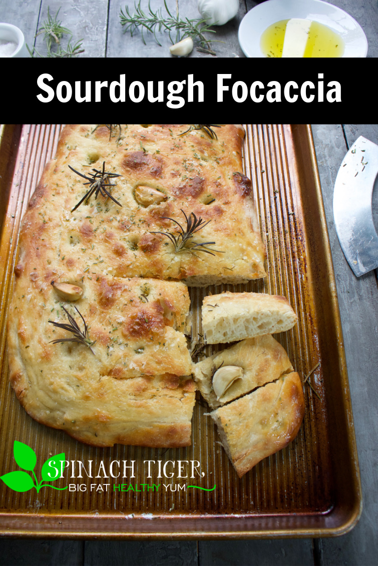 Easy to Make Sourdough Focaccia with fresh garlic, rosemary and flaked sea salt. Using Emilie Raffa's recipe, it's approachable and perfect. #spinachtiger #sourdoughrecipe #sourdoughfocaccia #focaccia via @angelaroberts