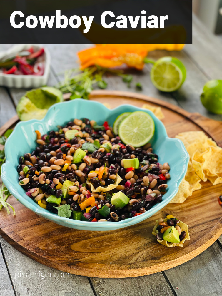Cowboy Caviar with Black Eyed Peas, Black Beans, Pickled Red Onion. Perfect appetizer or starter for Taco Night. #cowboycaviar #texascaviar #blackeyedpeas #blackbeans #pickledonion #spinachtiger via @angelaroberts