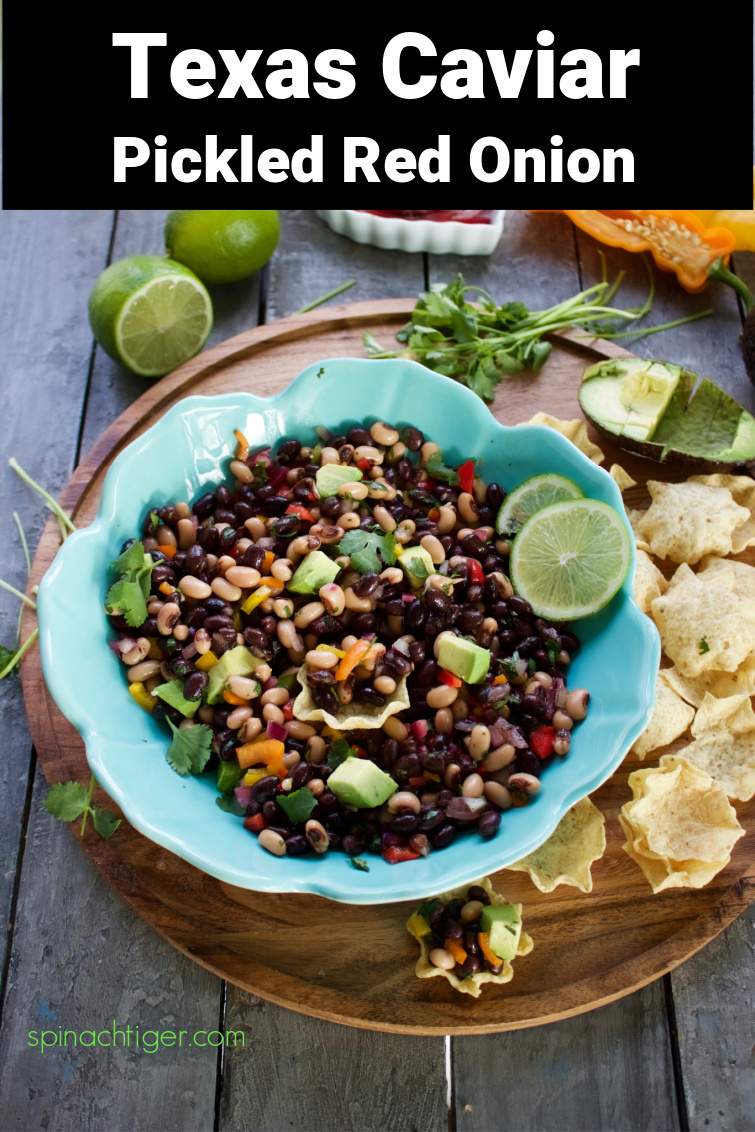 Cowboy Caviar with Black Eyed Peas, Black Beans, Pickled Red Onion. Perfect appetizer or starter for Taco Night. #cowboycaviar #texascaviar #blackeyedpeas #blackbeans #pickledonion #spinachtiger via @angelaroberts
