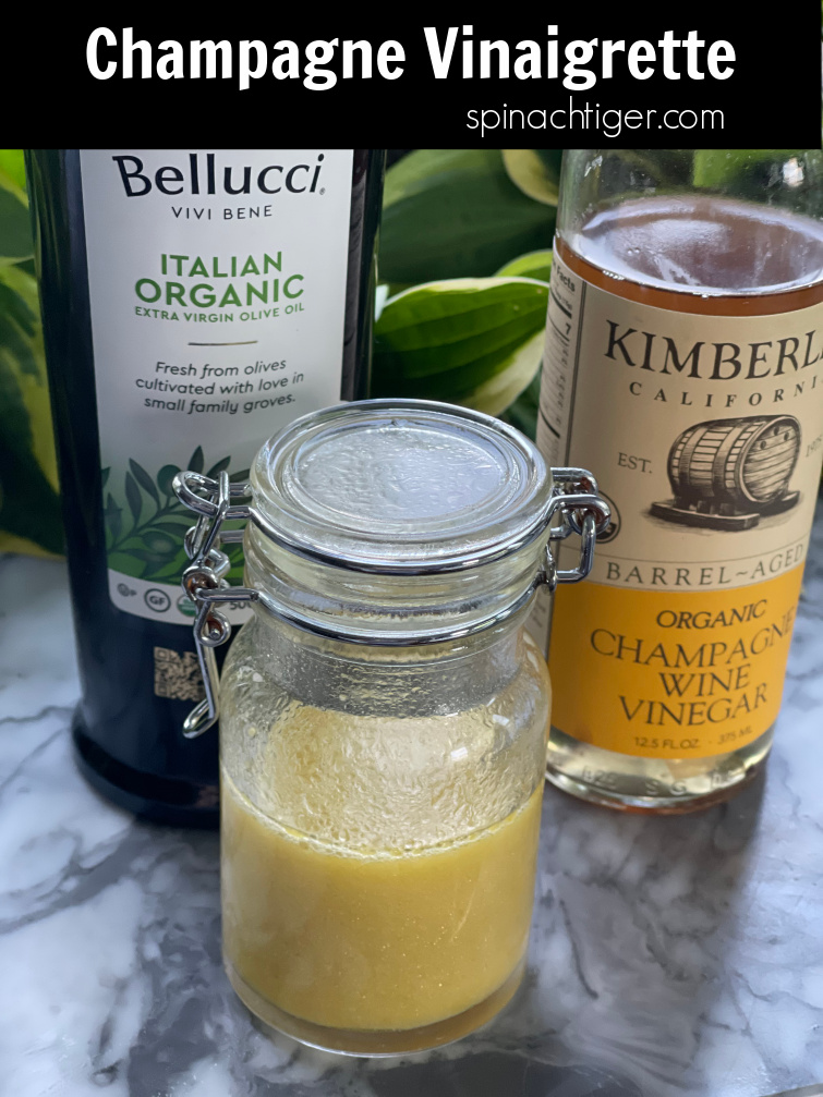 Make this simple, but perfectly balanced champagne vinegar. Find out why champagne vinegar makes such a great salad and how to achieve that balance. #saladdressing #champagnevinegar #vinagrette #spinachtiger via @angelaroberts