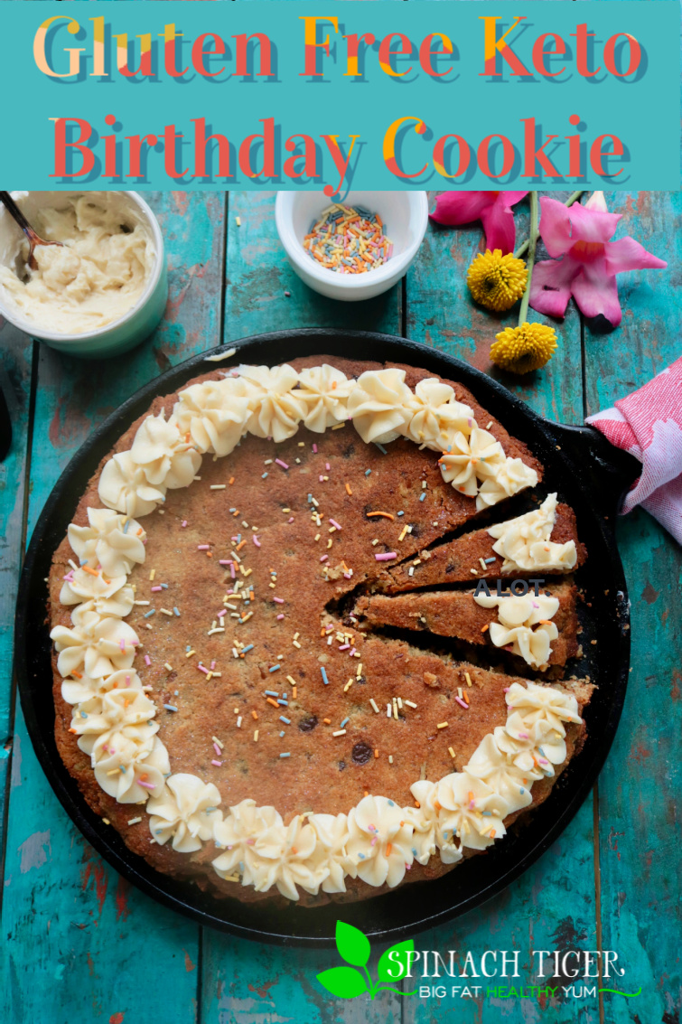 Make the perfect easy Keto Birthday Cookie Cake with buttercream frosting and it holds a candle. Grain Free, Sugar Free with Swerve. #ketocookiecake #keto #birthdaycookie #skilletcookie #spinachtiger #glutenfree #paloe via @angelaroberts