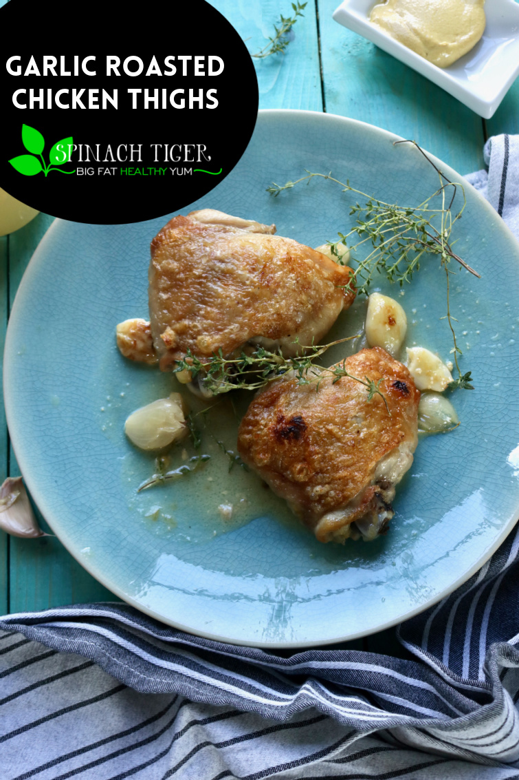 Garlic Roasted Chicken Thighs, an easy chicken dinner made with butter, thyme and fresh garlic. #chickenthighs #chickendinner #roastedchickenthighs #easydinners via @angelaroberts
