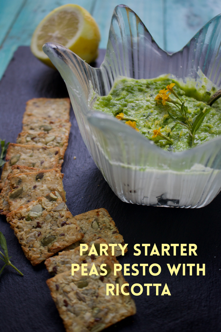 Make this low carb party starter in five minutes with fresh mint, frozen peas, lemon juice, served over ricotta cheese. #ricottacheese #appetizer #lowcarb #peas #mint via @angelaroberts