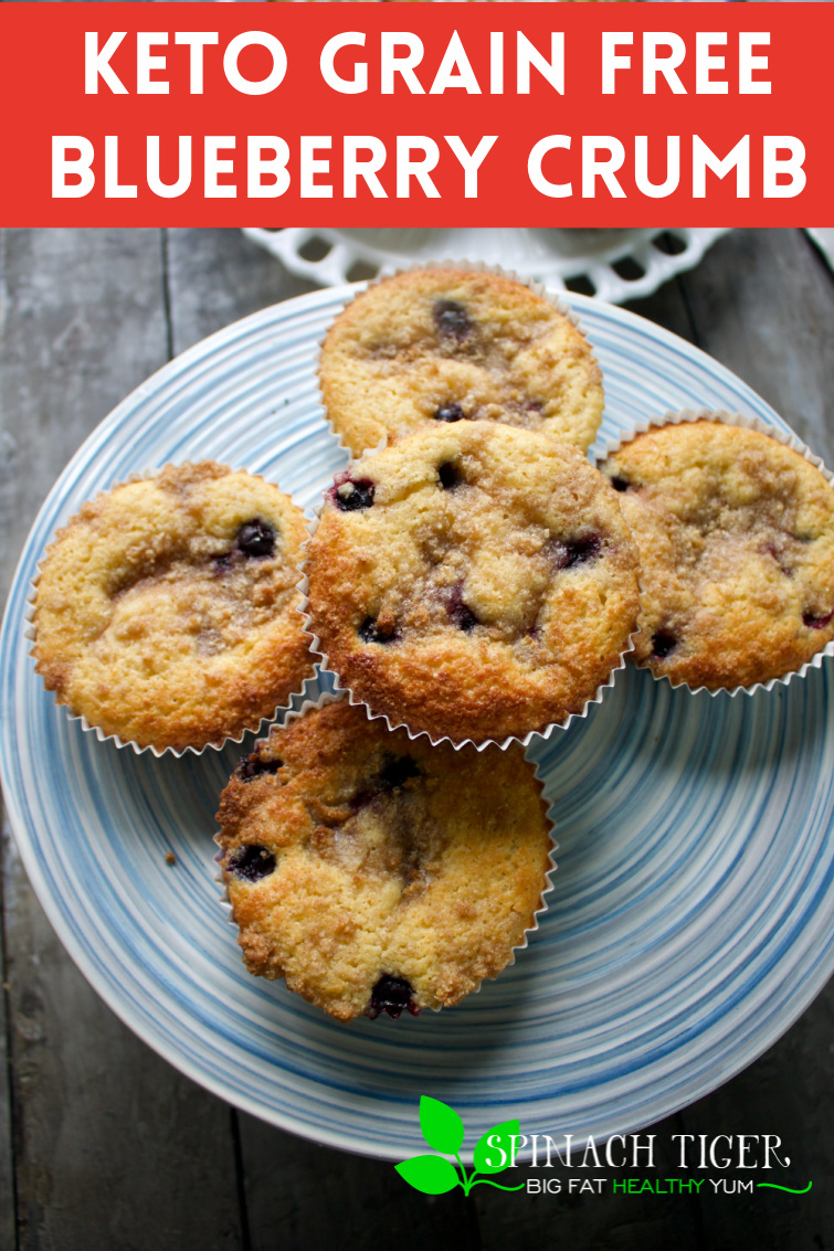 Easy to make low carb, gluten free, keto blueberry crumb muffins with fresh or frozen blueberries and cinnamon crumb topping. #spinachtiger #blueberrycrumbmuffins #keto #ketomuffins #blueberryrecipes #sugarfree #swerve #grainfree #paleo #glutenfree via @angelaroberts