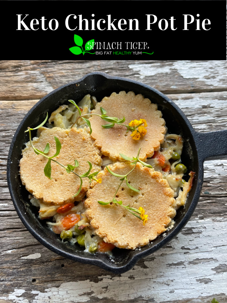 Creamy chicken pot pie made with chicken, fresh veggies, cream and wine for extra flavor. Almond flour crust. #glutenfree #paleo #keto #lowcarb #spinachtiger via @angelaroberts