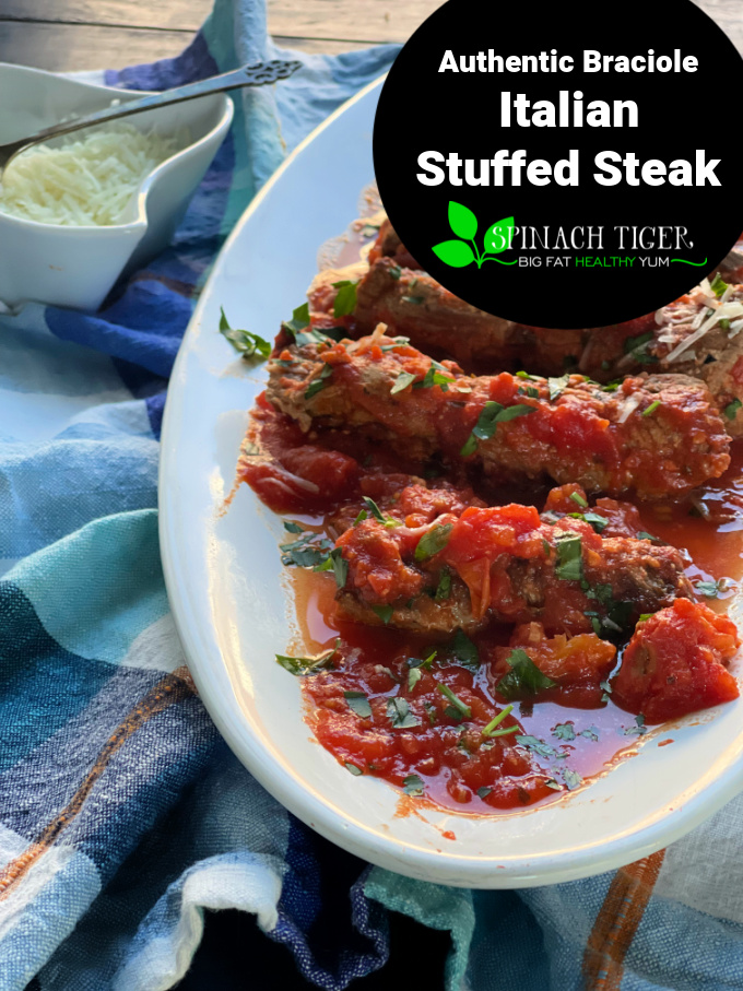 Braciole: Round Steak or Flank steak, stuffed with parmesan, parsley, garlic, rolled and braised in tomato sauce. Authentic recipe from my Italian Kitchen. Grain Free, Gluten Free. #braciole via @angelaroberts