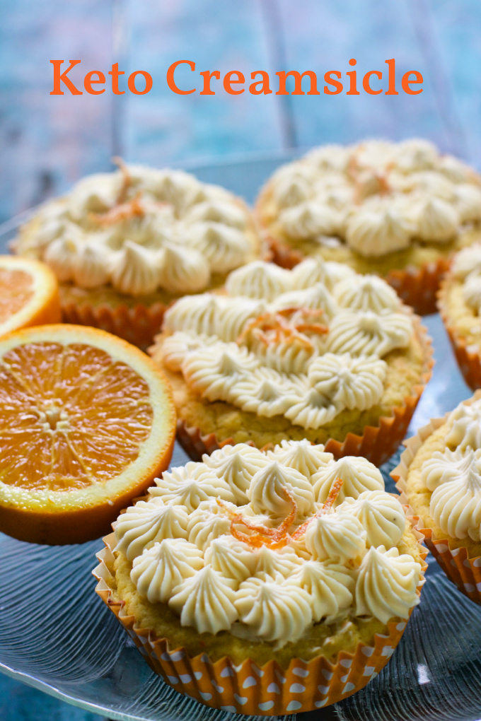 Keto Orange Creamsicle Cupcakes Recipe. Made with almond flour, real oranges, Swerve, these are sugar free, low carb, grain free and delicious, sold in our keto bakery. #almondflour, #coconutflour #orangecake #glutenfree. via @angelaroberts