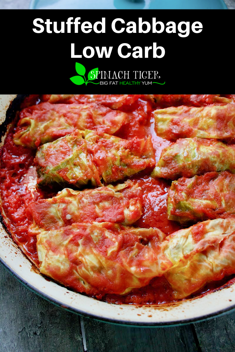 Low Carb Stuffed Cabbage Rolls with Tomato Sauce. Ground Beef with Cauliflower Rice, for a delicious comfort food dinner. #stuffedcabbage #cabbage #cabbagerolls #lowcarbdinner #ketodinner via @angelaroberts