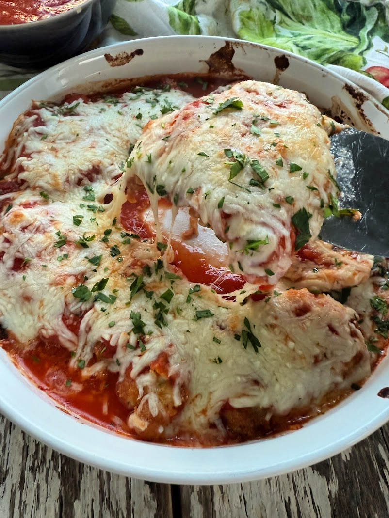 Keto Chicken Parmesan. Fry chicken in egg and pecorino cheese. Layer with sauce and mozzarella. #chickenparmesan #chickenparm via @angelaroberts